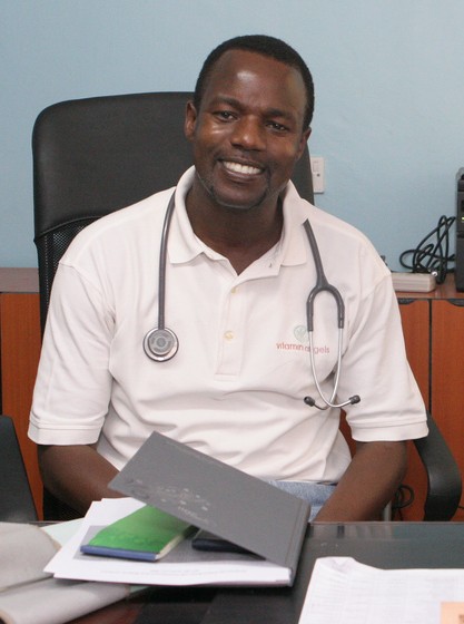 Dr. Mabeya smiles from his office at Gynocare Fistula Center.