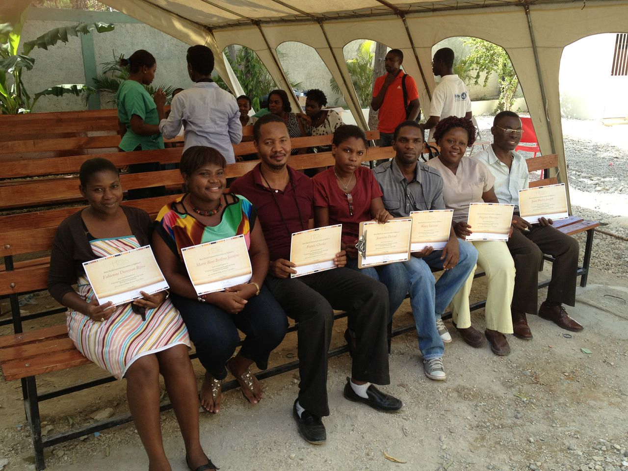 Haitian providers receiving their certificates for cervical cancer screening.