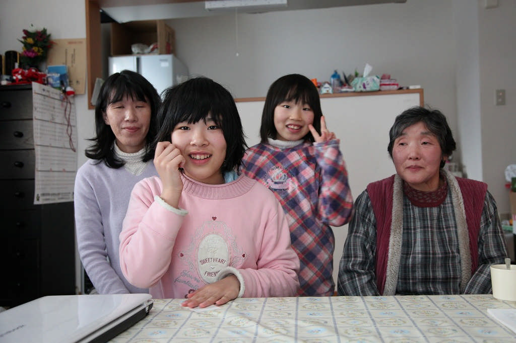 12-year-old Haruka (front) and her family were able to relocate with help from Japan Relief and Recovery Funds. Photo courtesy of the Association for Aid and Relief, Japan. 12-year-old Haruka (front) and her family were able to relocate with help from Japan Relief and Recovery Funds. Photo courtesy of the Association for Aid and Relief, Japan.