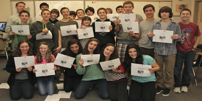 Milwaukee Jewish Day School students pose with their certificates. Milwaukee Jewish Day School students pose with their certificates.
