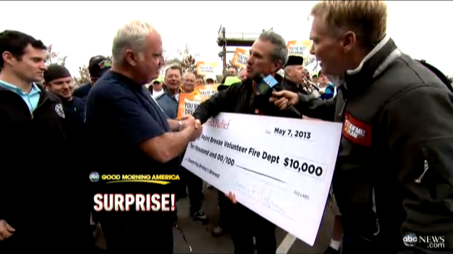 Direct Relief President and CEO, Thomas Tighe, presents a check to the Point Breeze Volunteer Fire Department. Direct Relief President and CEO, Thomas Tighe, presents a check to the Point Breeze Volunteer Fire Department.