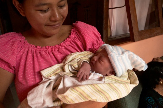 A mother with her new baby at Bumi Sedat Indonesia. Photo courtesy Bumi Sedat.