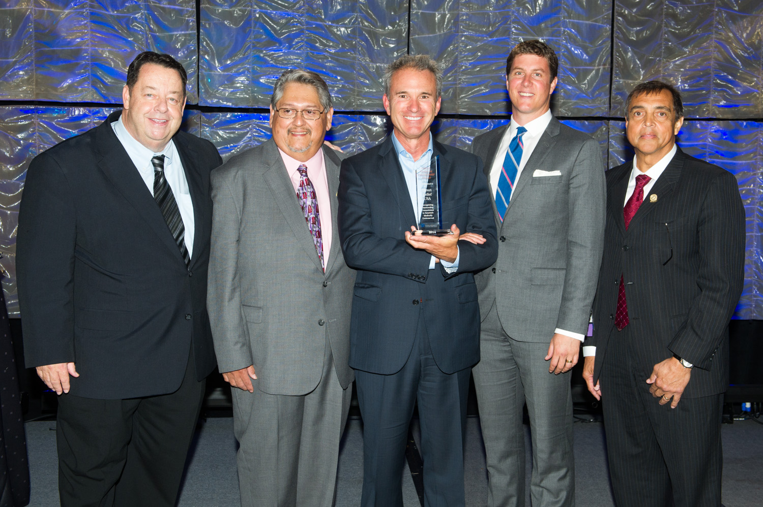 From left to right, Tom Van Coverdan, Ricardo Guzman, Thomas Tighe, Damon Taugher, Gary Wiltz M.D.