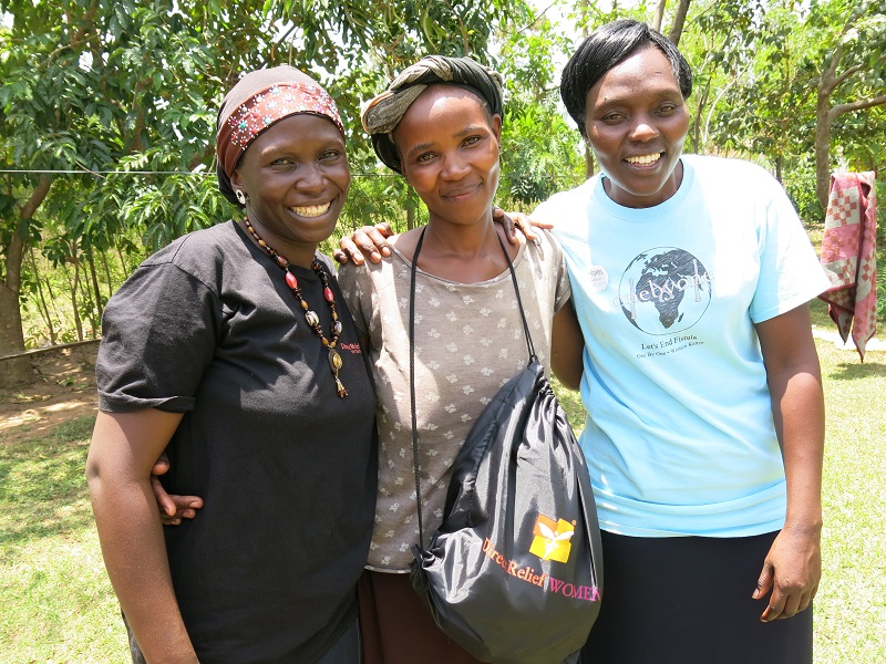 A fistula patient in Kenya smiles with a Dignity Kit. Courtesy photo.