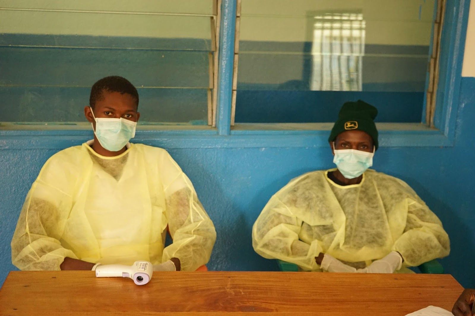 Medical staff often must decide between treating a sick patient and taking the risk of contracting Ebola.