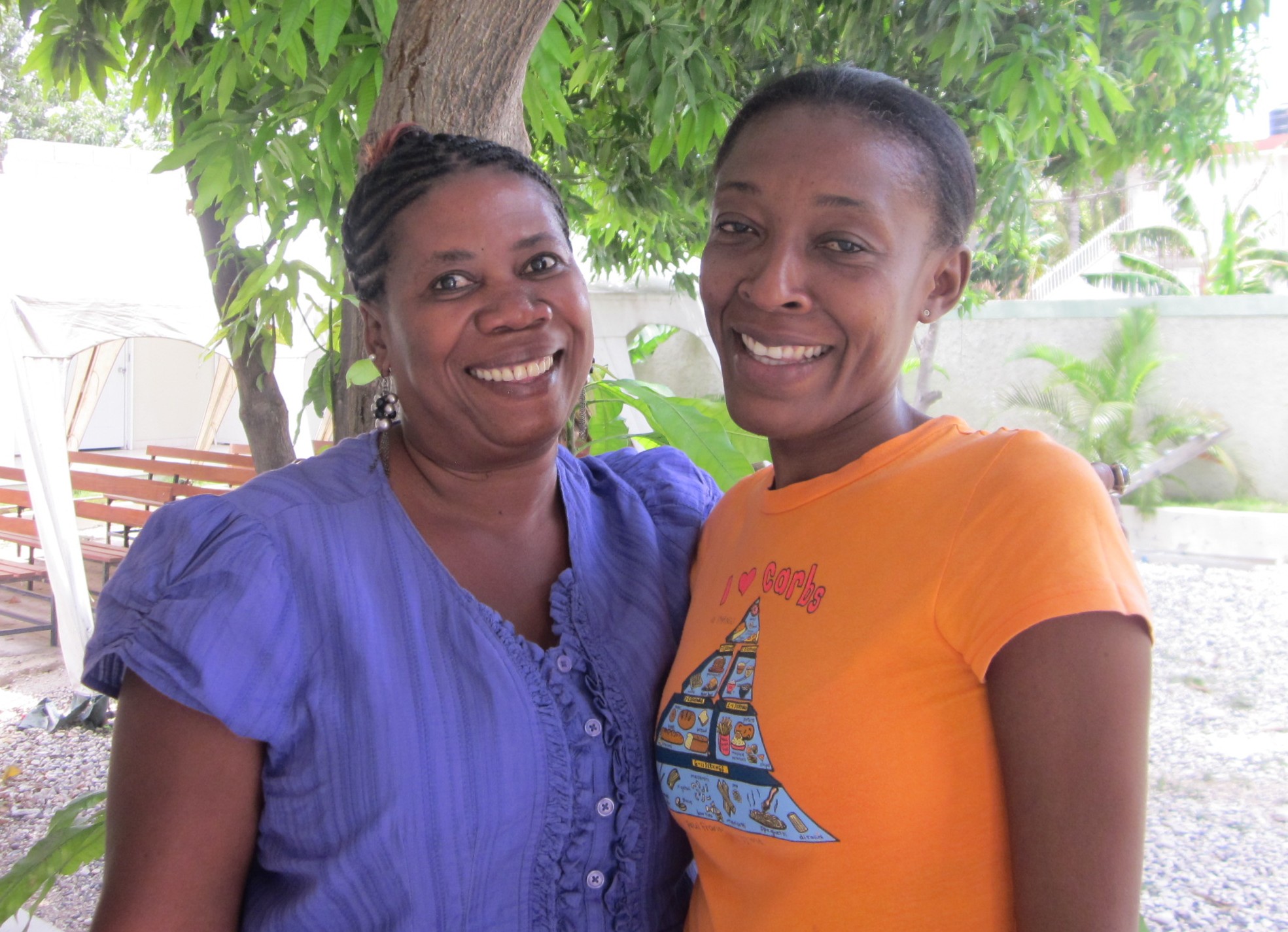 Yolette (left) and Adeline (right) promote cervical cancer screenings in their community in Haiti. haiti health promoters