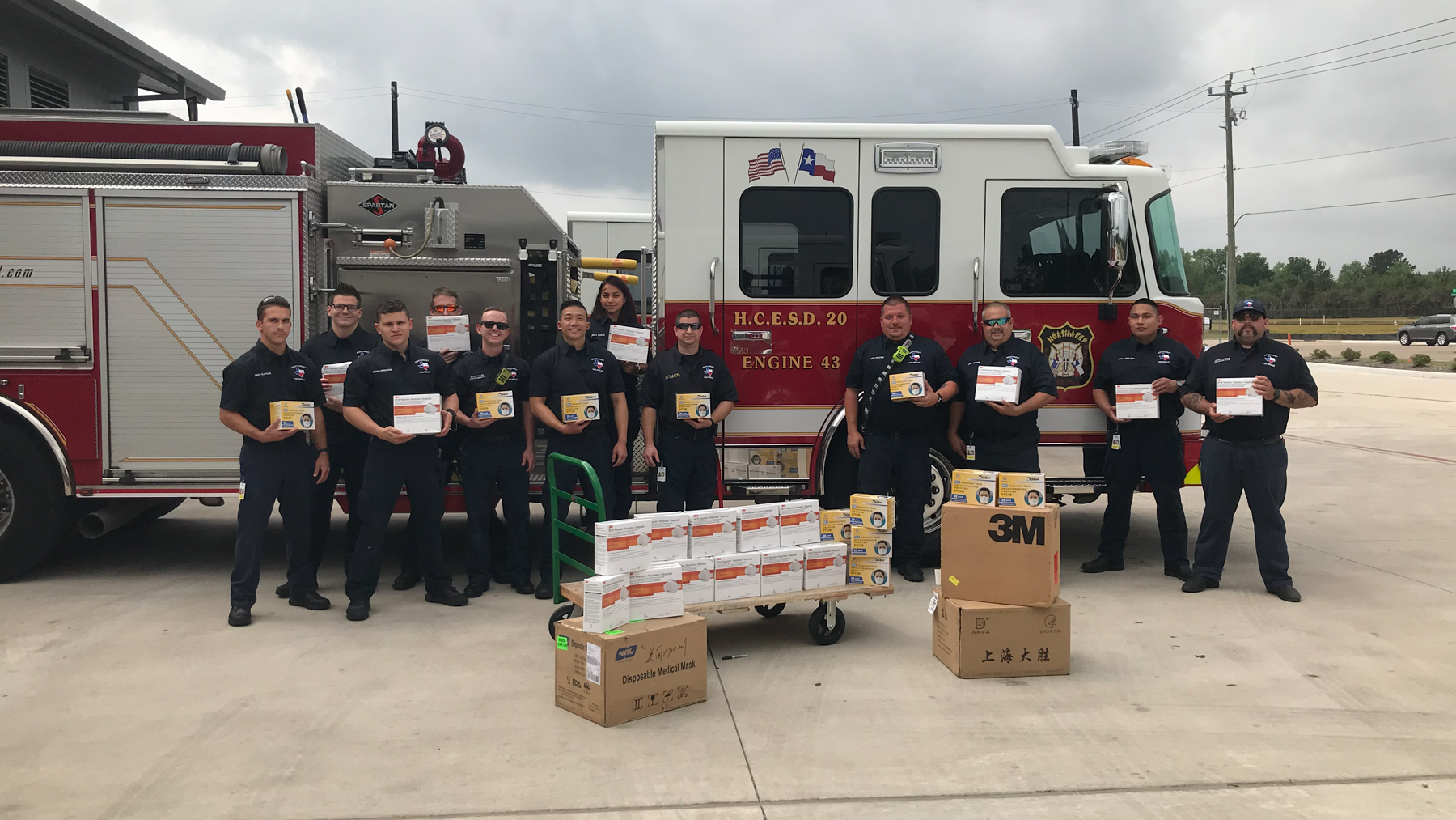 Northwest Volunteer Fire Department (Harris County, Tx.) members in front of a Direct Relief shipment of PPE and supplies. (Photo Courtesy of NWVFD)
