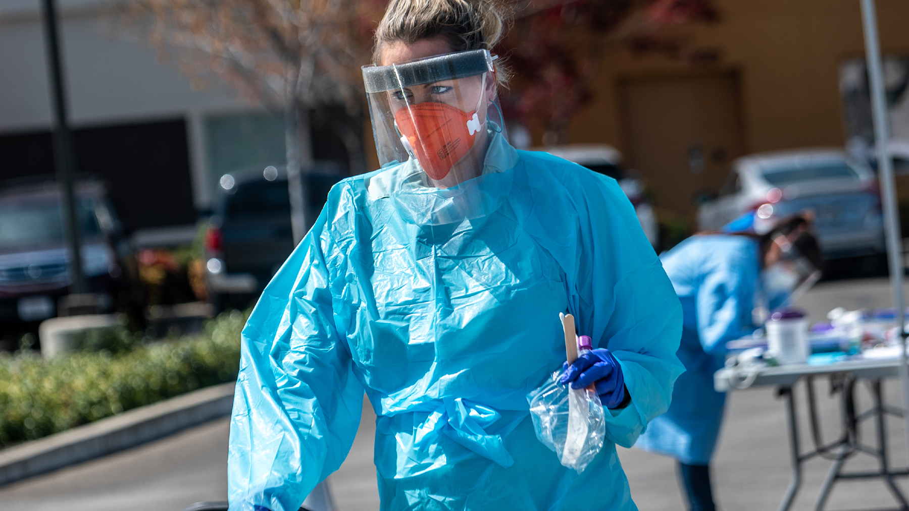 Staff with Ampla Health Care conduct Covid-19 testing at a drive-through site in Yuba City, California. The site was provided with protective gear from Direct Relief. (Photo by Renée C. Byer/ZUMA Wire)