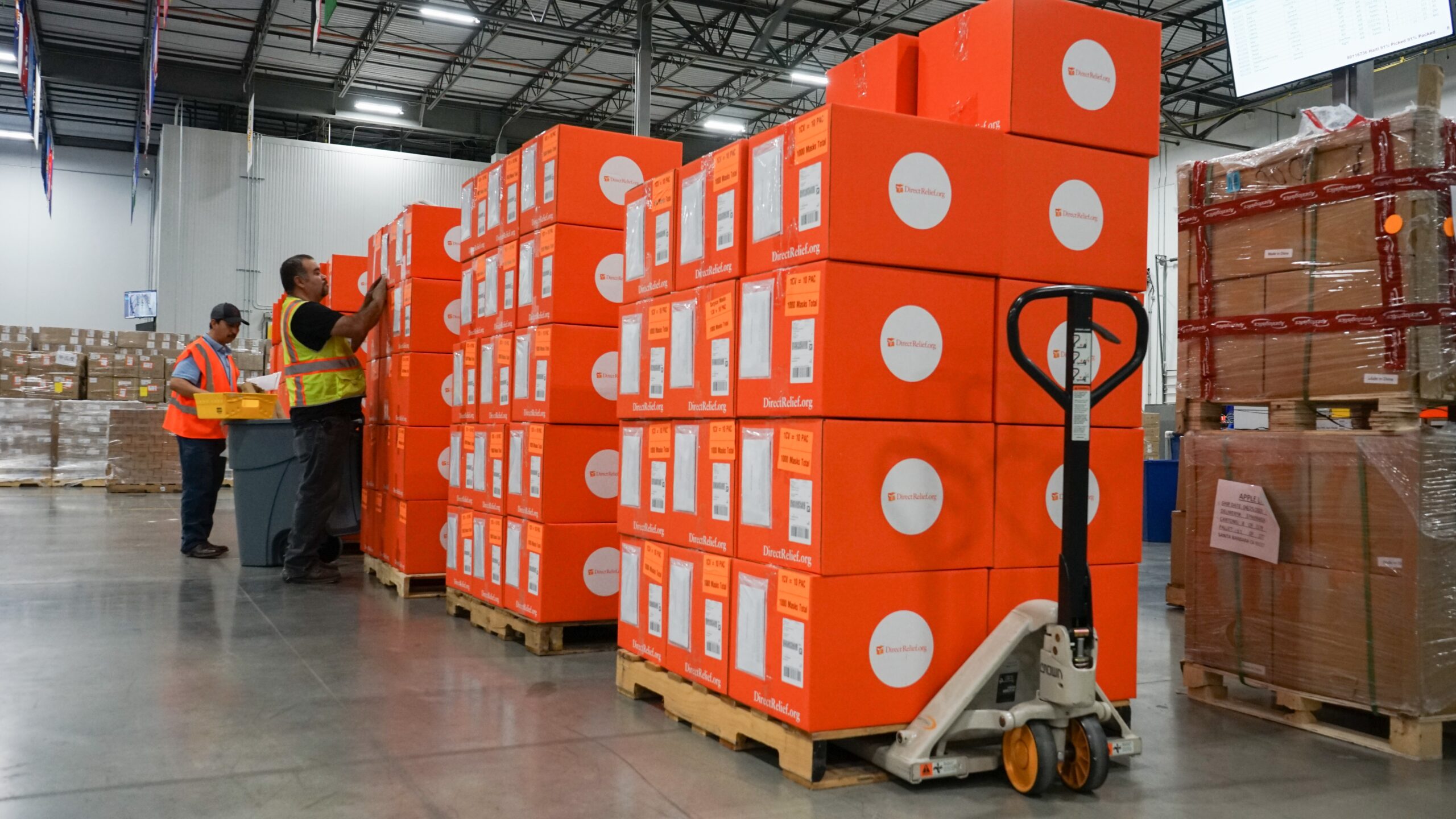 More than 1,000 shipments of protective gear are prepped for shipment in Direct Relief's warehouse on May 7, 2020, in response to the Covid-19 outbreak. (Lara Cooper/Direct Relief)