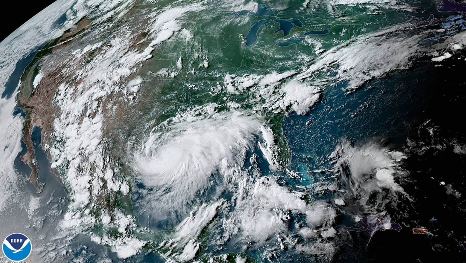 Tropical Storm Hanna, pictured left, is barreling towards the Texas coast, while Tropical Storm Gonzalo continues its path through the Caribbean. (NOAA photo)