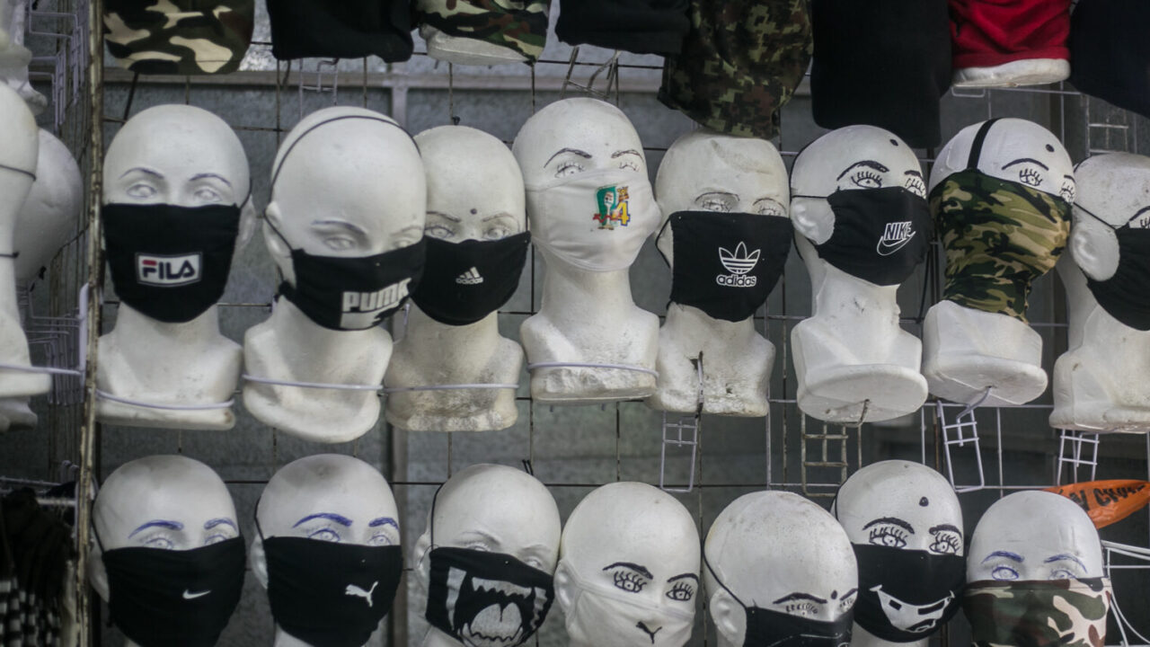 Face masks sporting different brands for sale in one of the open air markets in Iztapalapa, Mexico. (Meghan Dhaliwal/Direct Relief)