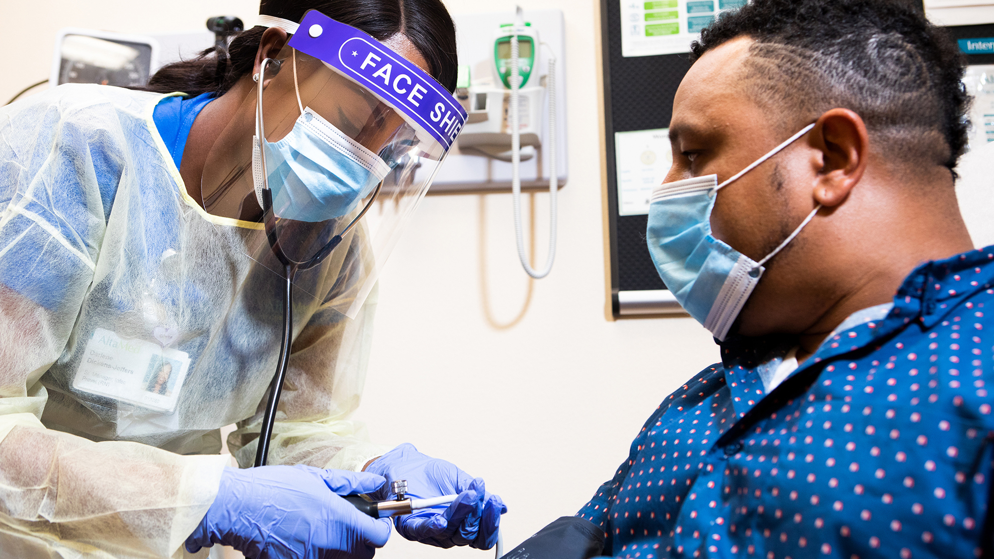 A medical provider at Alta Med, a health center with 35 sites in Los Angeles and Orange Counties, provides care to a patient in Dec. 2020. The health center sees more than 300,000 patients each year, and Direct Relief has shipped protective gear and requested medical essentials to the provider throughout the pandemic. (Photo courtesy of Alta Med)