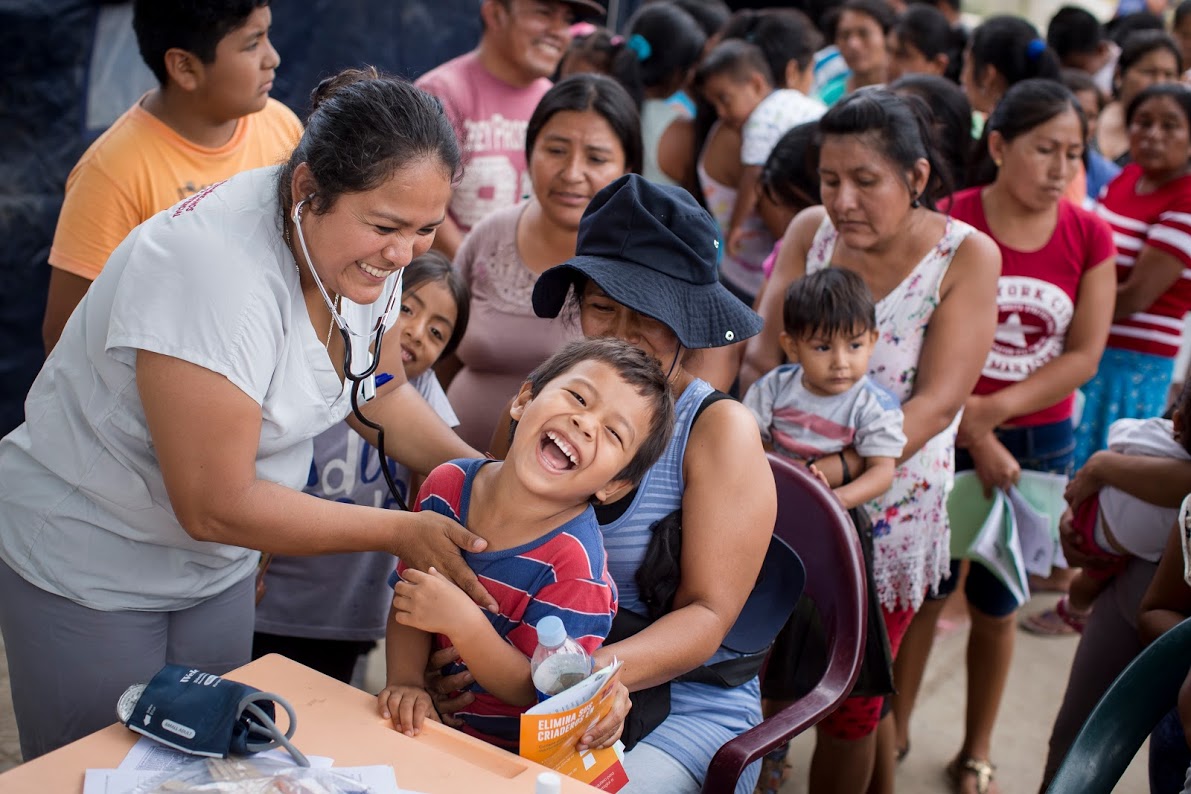 Doctors take care of patients as part of a medical volunteer campaign supported by Vida Peru, Direct Releif among other organizations, to help villagers affected by floods, in Cura Mori, Piura on April 8, 2017.