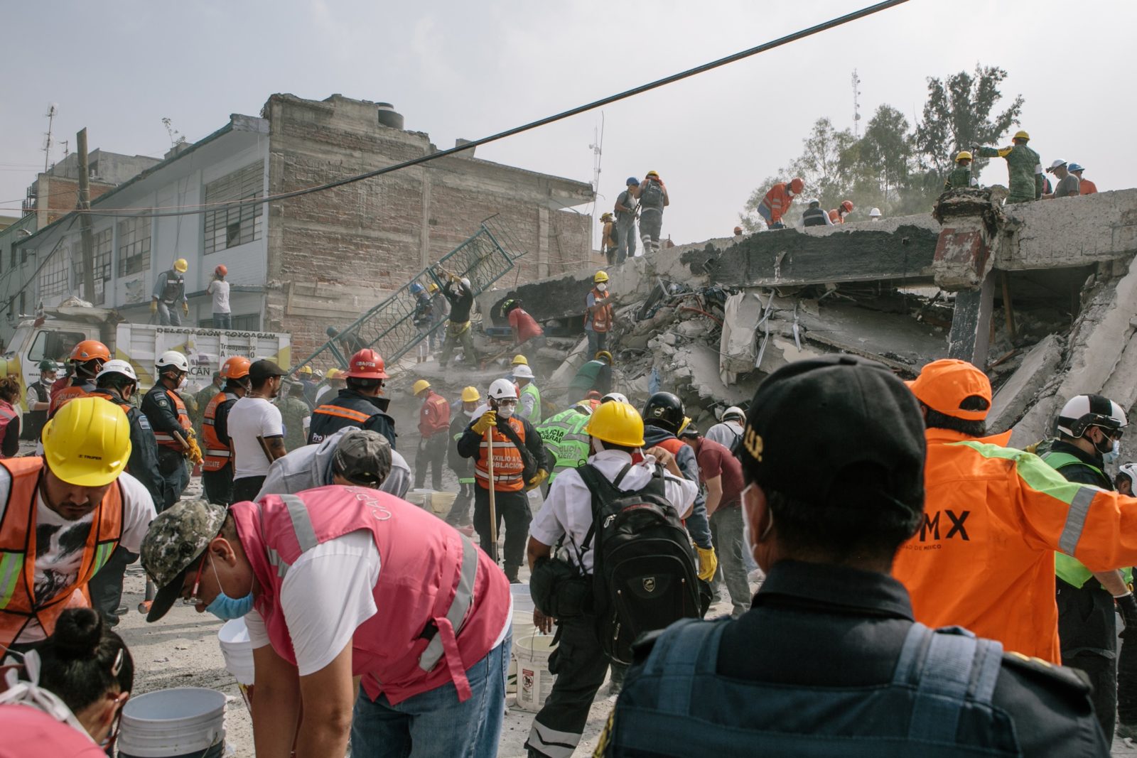 Volunteers, military, police, and city rescue workers dig through the rubble of a fallen textile factory in the Obrera neighborhood of Mexico City on Wednesday Sept. 20, 2017 a day after an earthquake collapsed many buildings in the city. There are still suspected survivors inside.
© Meghan Dhaliwal 2017
meghan.k.dhaliwal@gmail.com